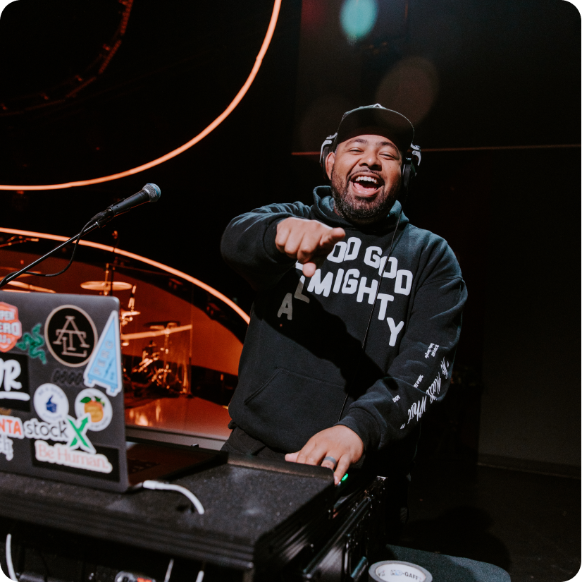 DJ pointing at the camera