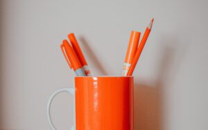 What Makes Orange a Unique Solution to a Common Problem